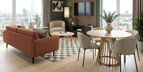 Modern apartment living area with warm colours, couch, chair, coffee table, dining area and modern decor