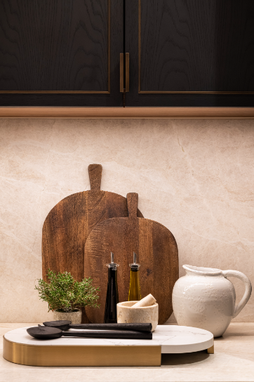 kitchen area with chopping boards and wooden spoons